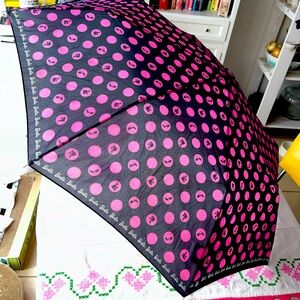 Barbie Avon umbrella cameo logo